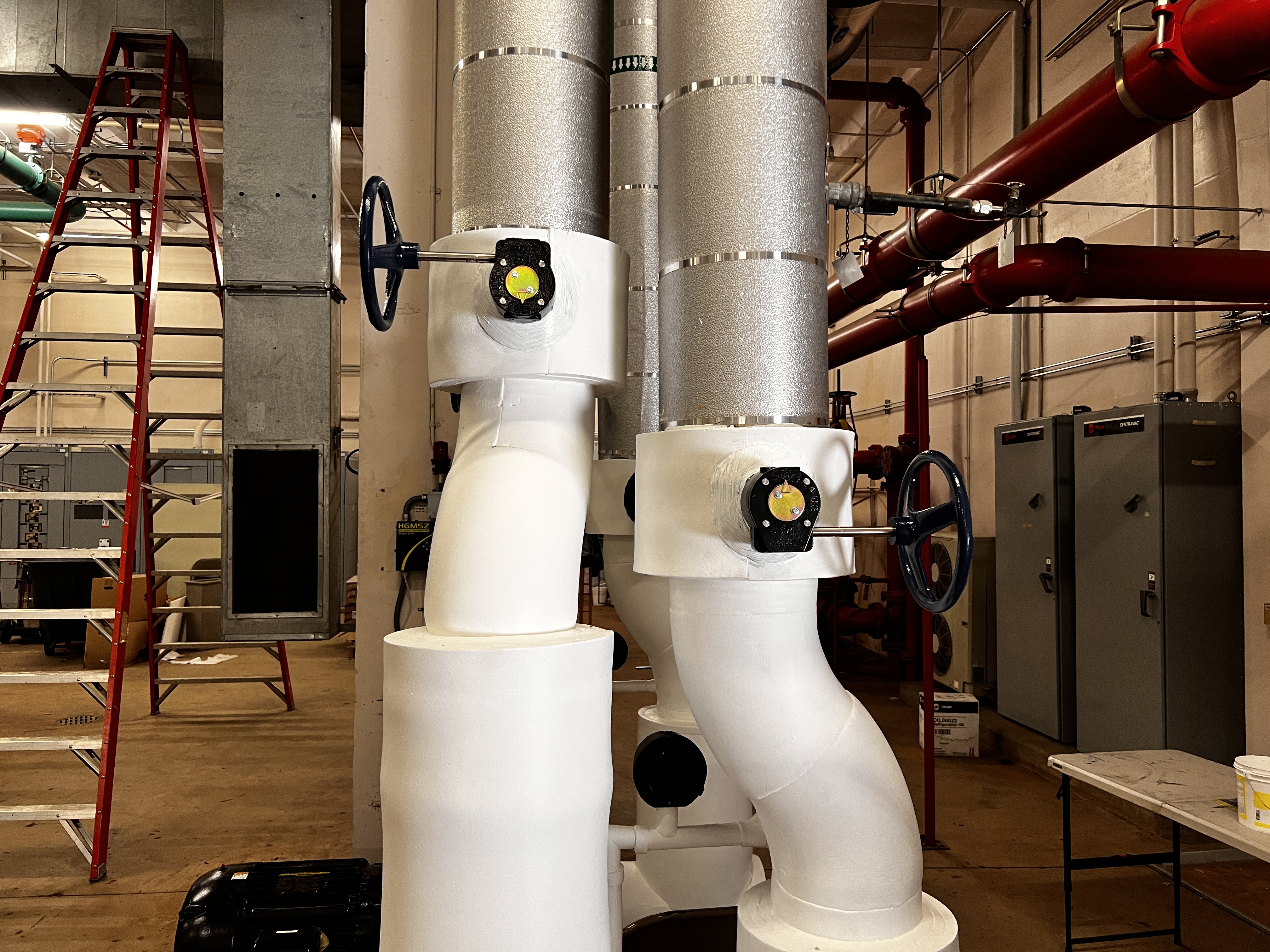 Photograph of the butterfly valves and the outer insulation